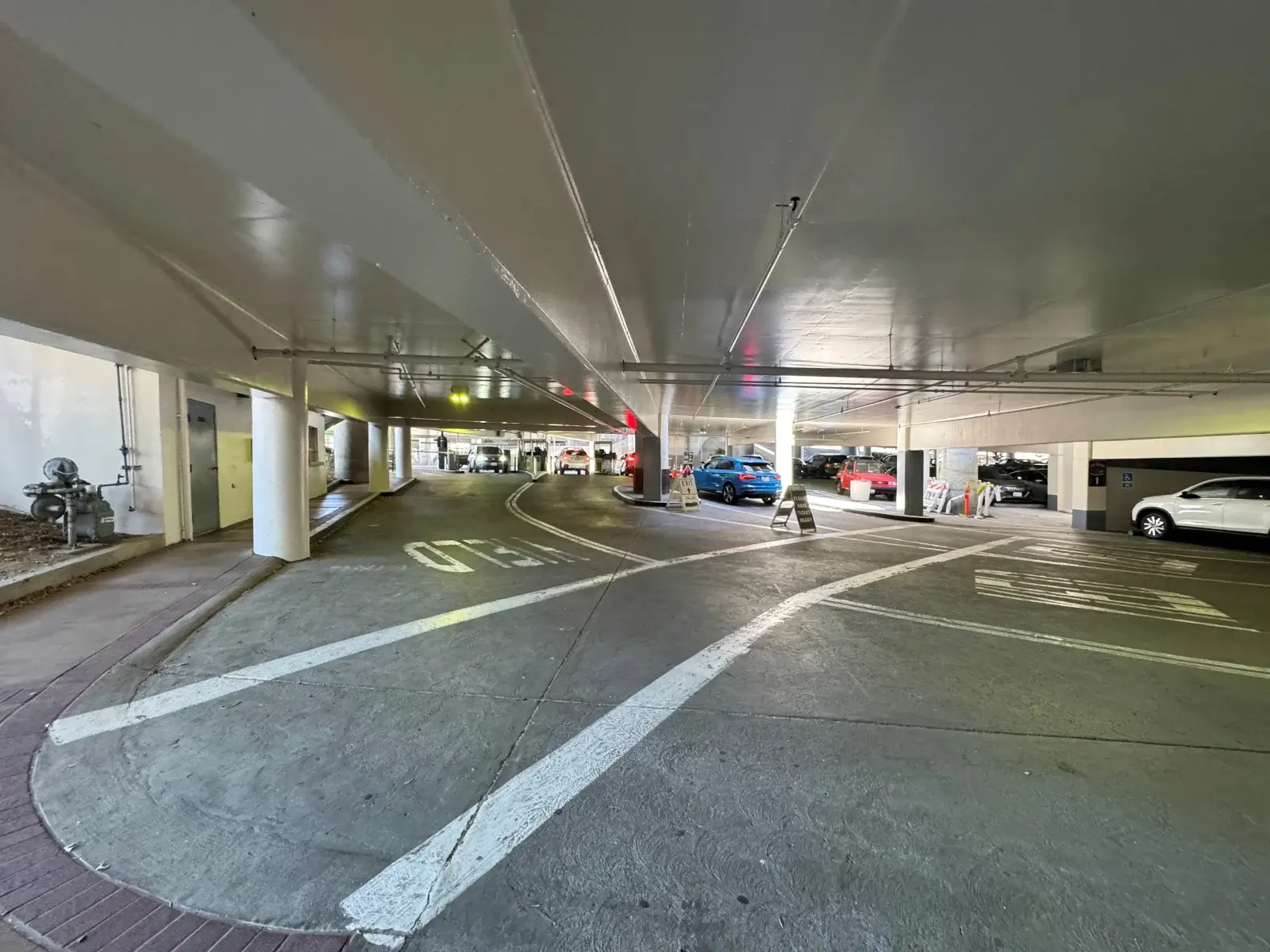 After Old Sacramento parking garage, in Sacramento, CA, ceilings and walls were painted by Blackhawk Painting, Inc.