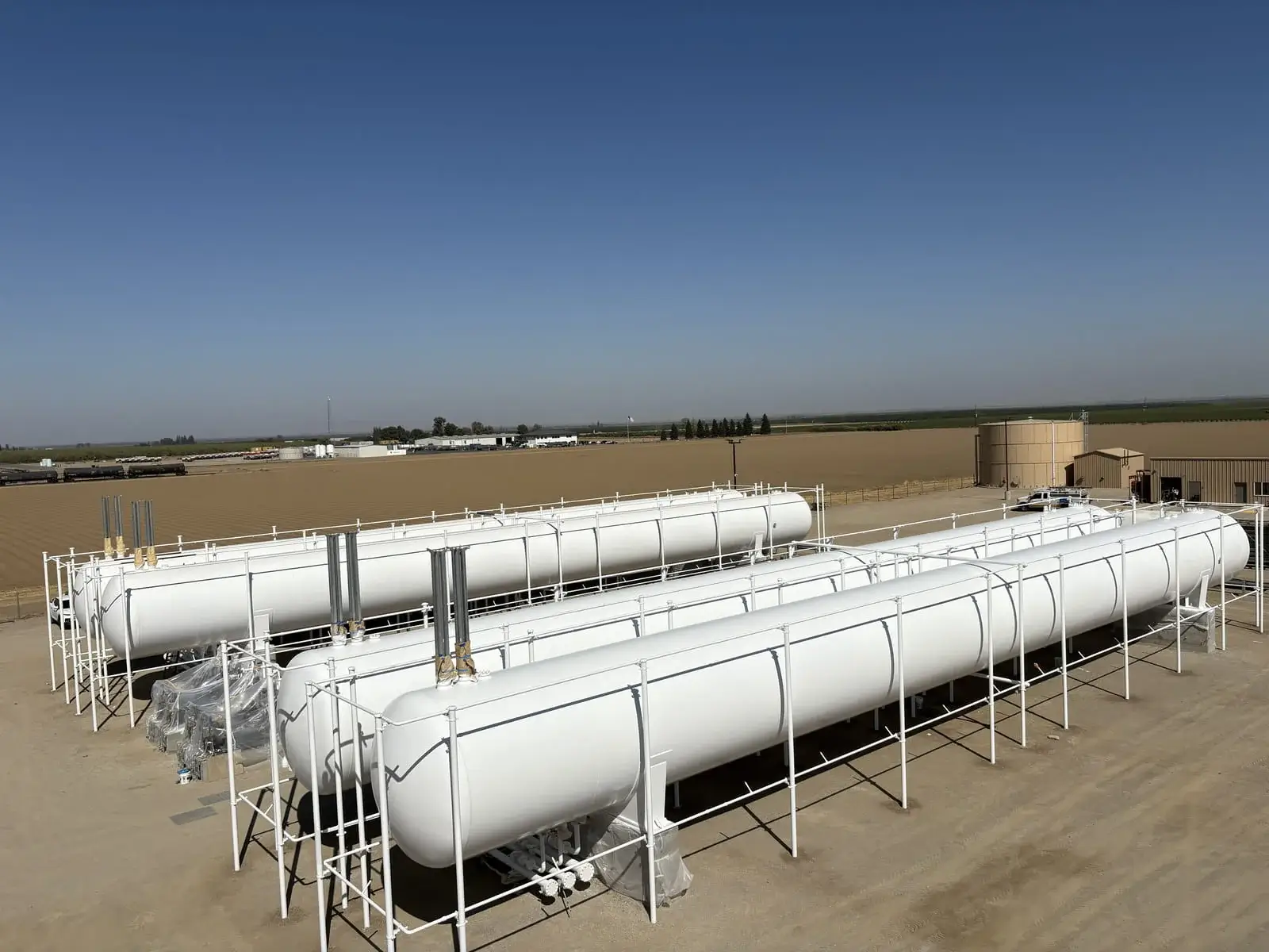 TransTech Energy's LPG Terminal in Arbuckle, CA with four 90,000 Gallon AST Tanks with high performance 2 part urethane system provided by Blackhawk Painting, Inc.